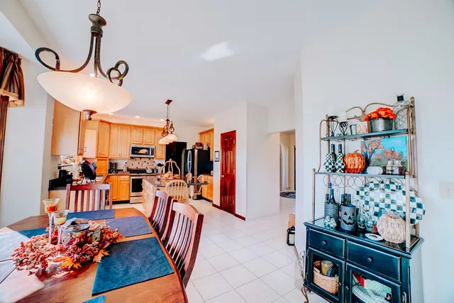 a bathroom with a toilet a sink and curtain