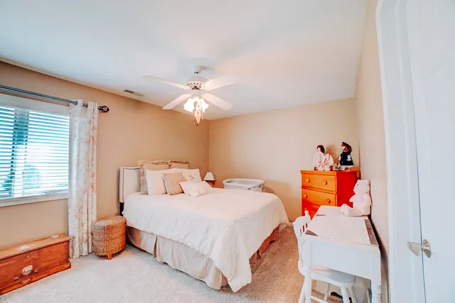 a view of a swimming pool and a yard