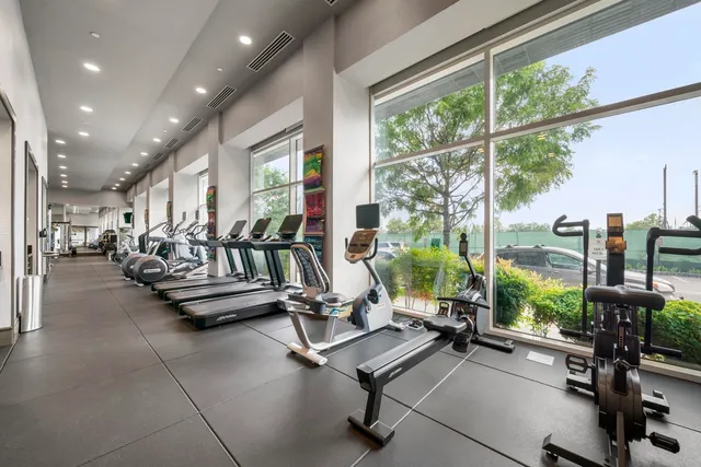 a playing room with toys and a large window