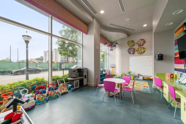 a view of a garden with potted plants