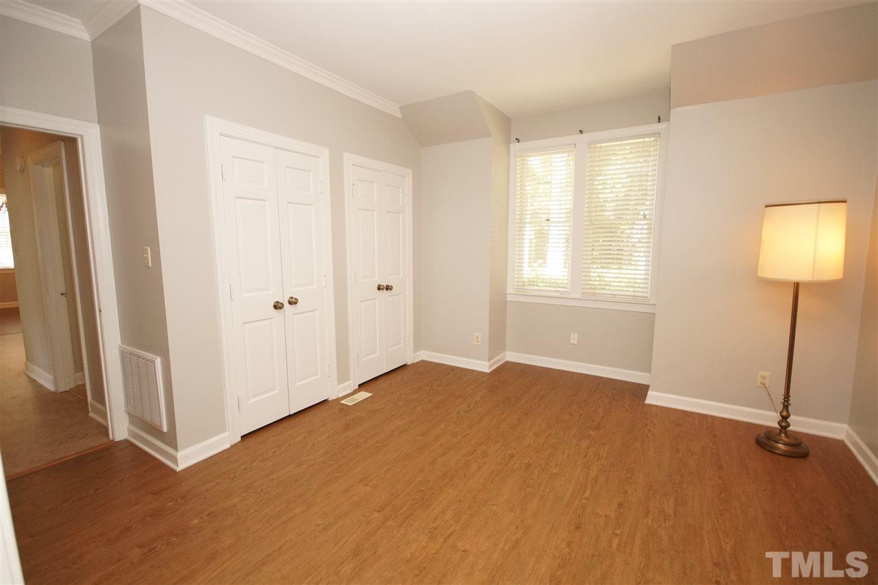 1729 Falls Church Road Raleigh, NC 27609 - Photo 17 of 25 a view of an empty room with a window