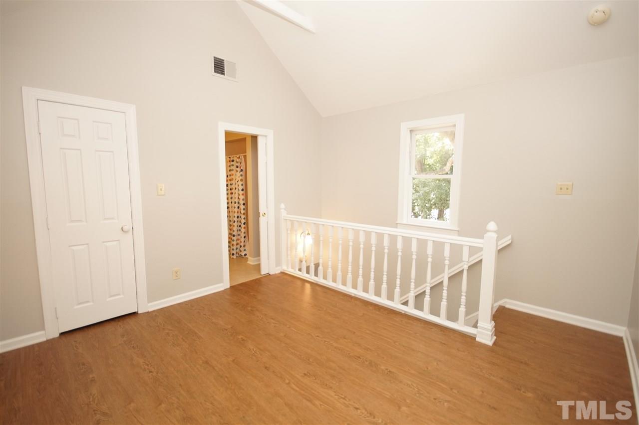 1729 Falls Church Road Raleigh, NC 27609 - Photo 21 of 25 a view of an empty room with a window