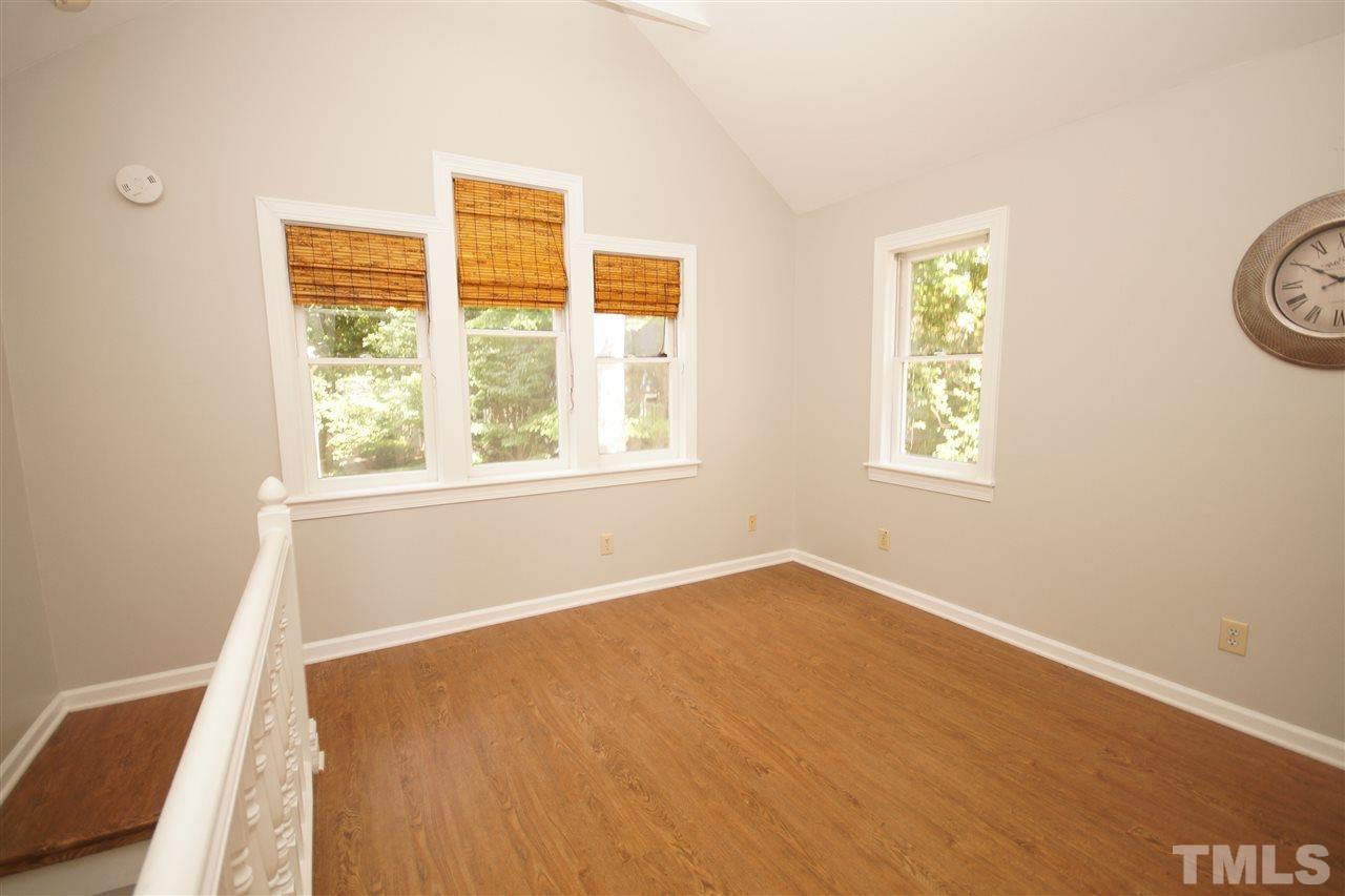 1729 Falls Church Road Raleigh, NC 27609 - Photo 22 of 25 a view of an empty room with a window
