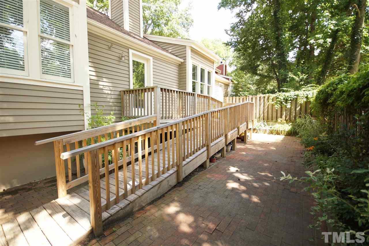 1729 Falls Church Road Raleigh, NC 27609 - Photo 24 of 25 a view of a house with backyard and deck