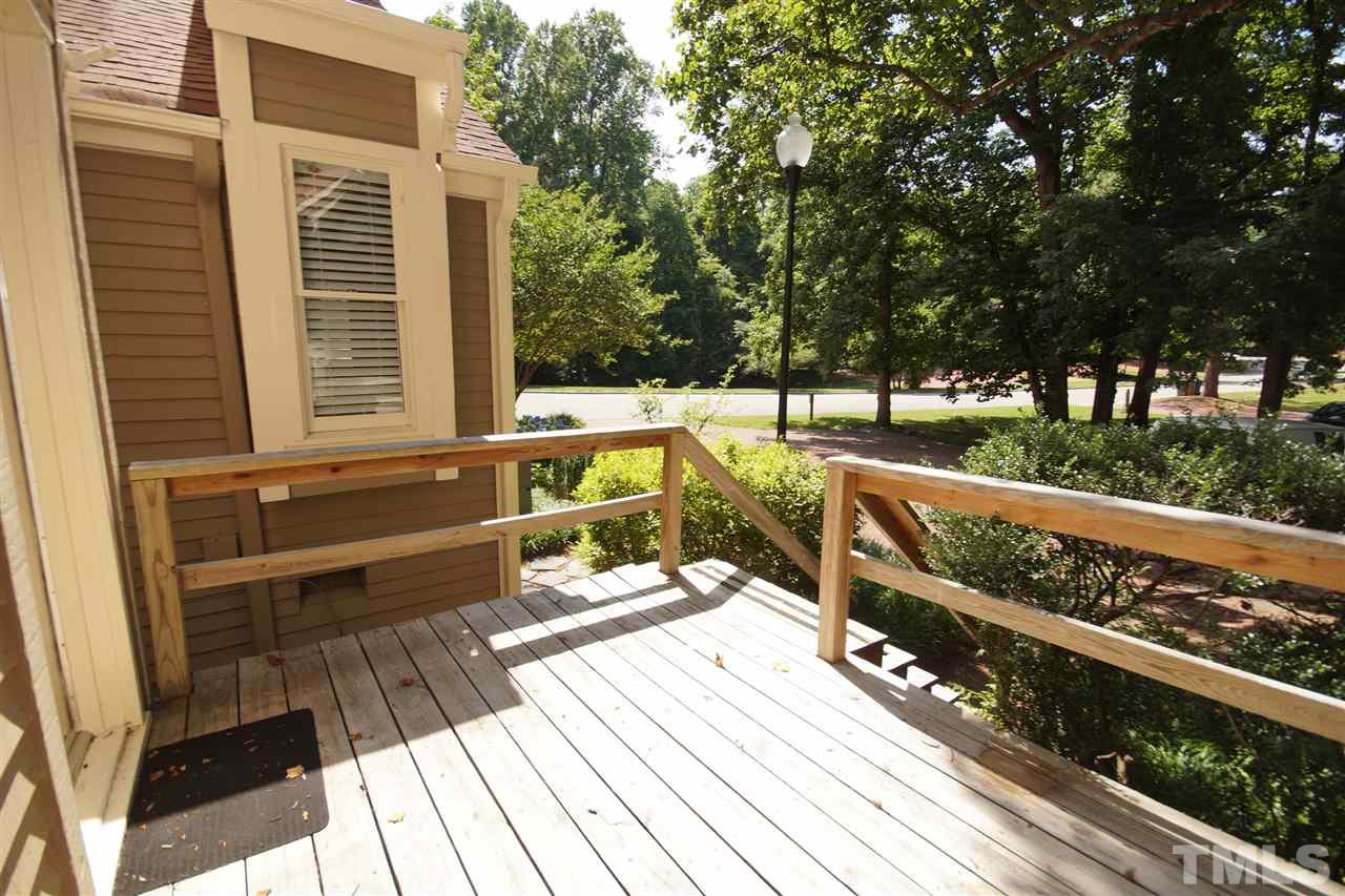 1729 Falls Church Road Raleigh, NC 27609 - Photo 25 of 25 a view of balcony with wooden floor and outdoor seating