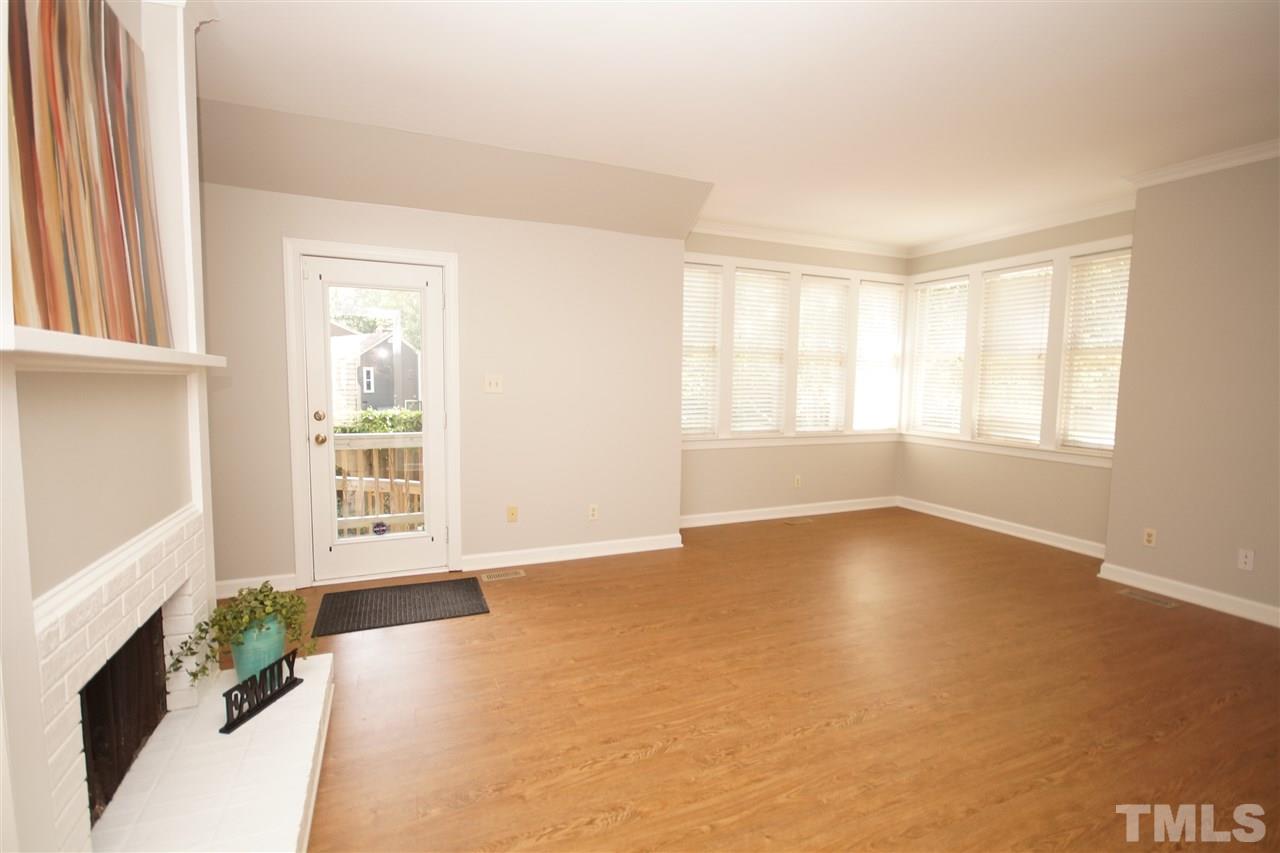 1729 Falls Church Road Raleigh, NC 27609 - Photo 6 of 25 an empty room with windows