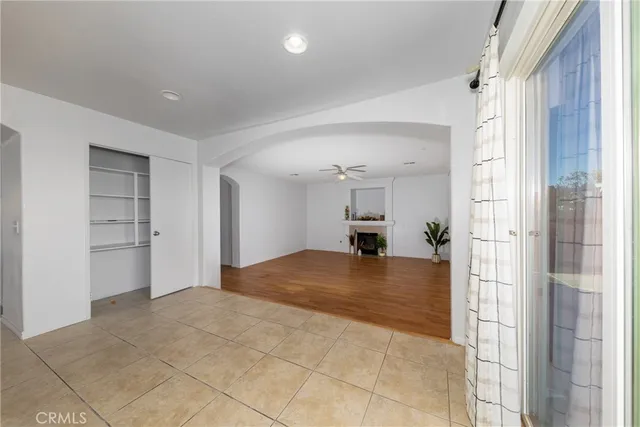 a view of kitchen with livingroom and window