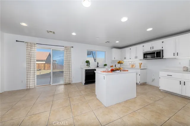 a kitchen with a cabinets and counter space