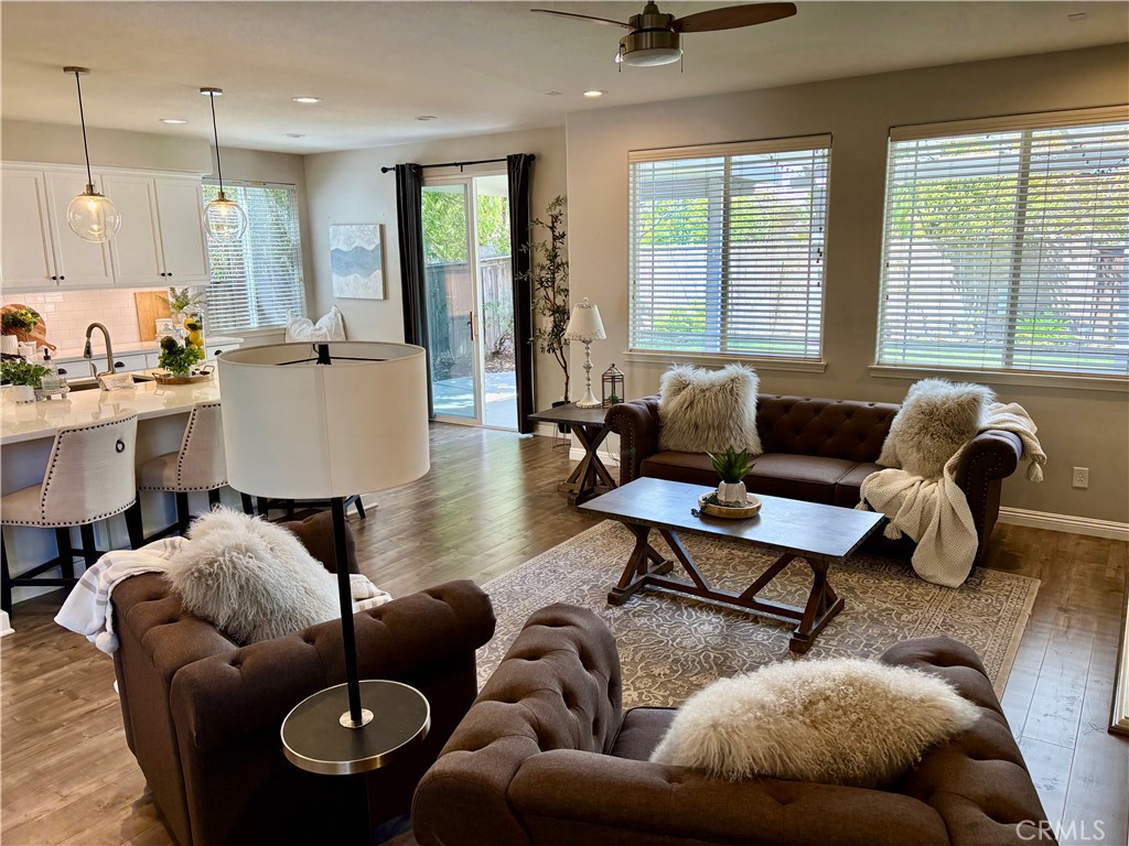 39707 Cambridge Place Temecula, CA 92591 - Photo 12 of 75 a living room with furniture or couch and a large window