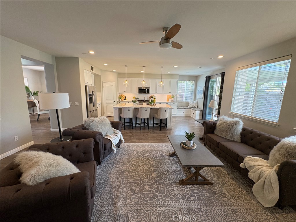 39707 Cambridge Place Temecula, CA 92591 - Photo 13 of 75 a living room with furniture and a couch