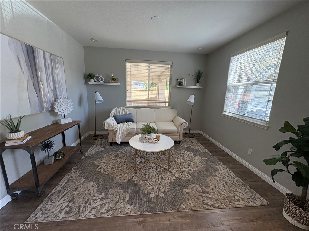 39707 Cambridge Place Temecula, CA 92591 - Photo 28 of 75 a living room with furniture and a window