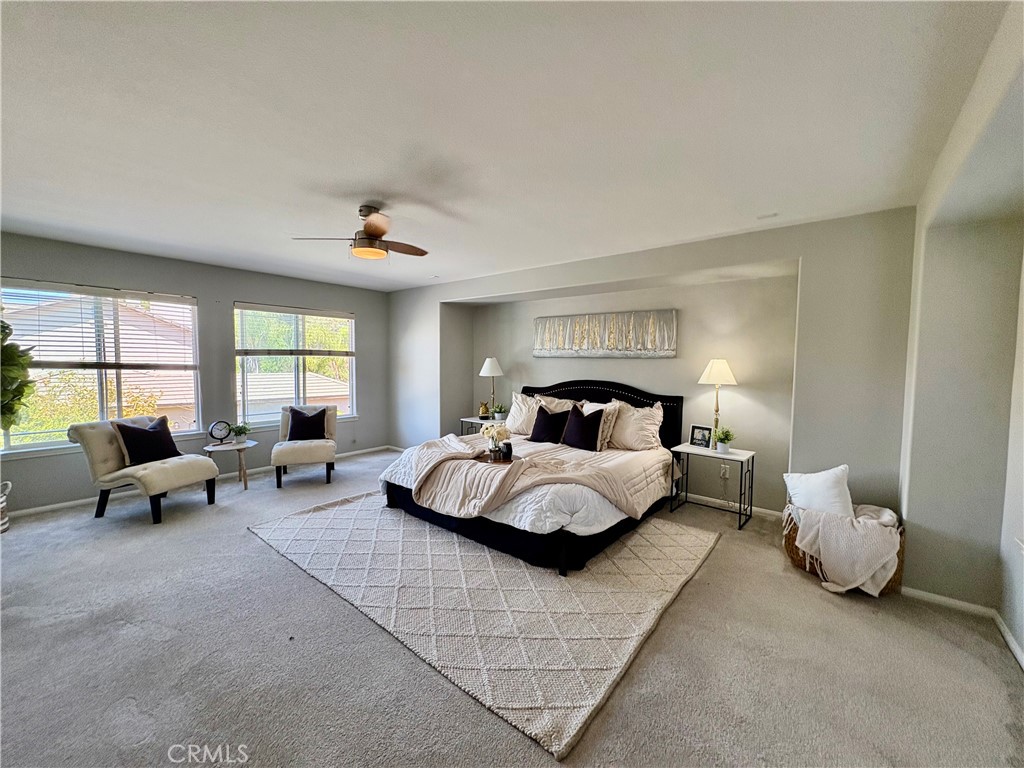 39707 Cambridge Place Temecula, CA 92591 - Photo 30 of 75 a bed room with bed and a window