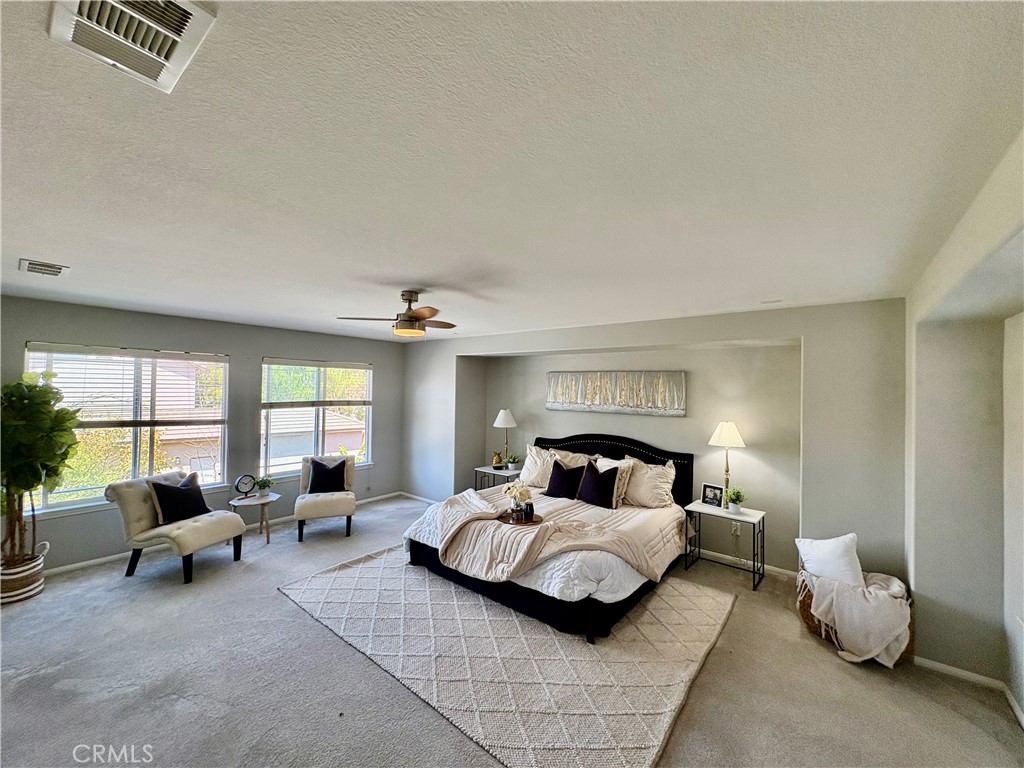 39707 Cambridge Place Temecula, CA 92591 - Photo 5 of 75 a bedroom with furniture and a large window