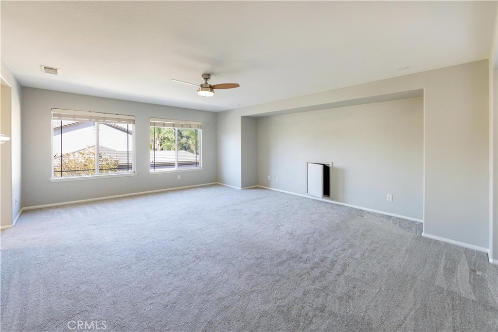 39707 Cambridge Place Temecula, CA 92591 - Photo 55 of 75 a view of an empty room with a window