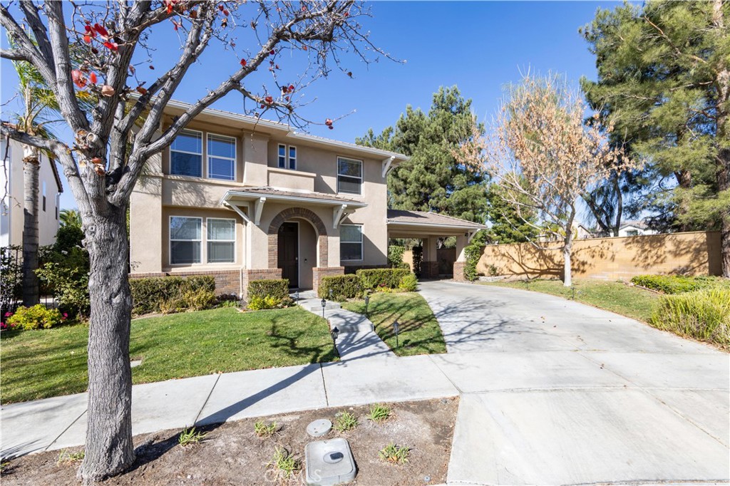 39707 Cambridge Place Temecula, CA 92591 - Photo 73 of 75 a front view of a house with a yard