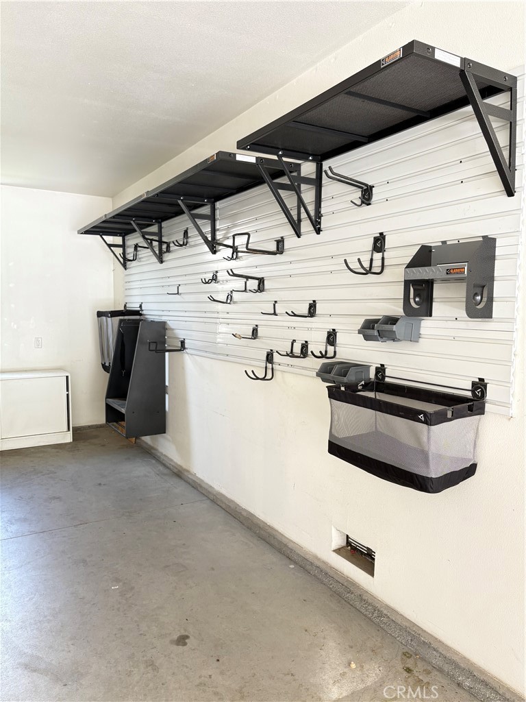 39707 Cambridge Place Temecula, CA 92591 - Photo 75 of 75 a utility room with dryer and washer
