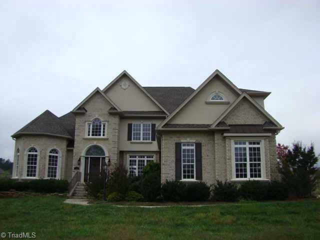 7033 Denison Road Summerfield, NC 27358 - Photo 1 of 8 Exterior Front.
