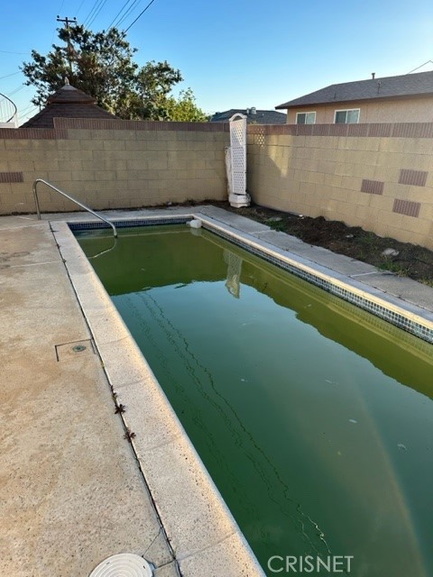 19309 Cliveden Avenue Carson, CA 90746 - Photo 4 of 4 a view of a backyard
