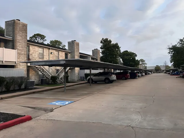 a view of street with parked cars