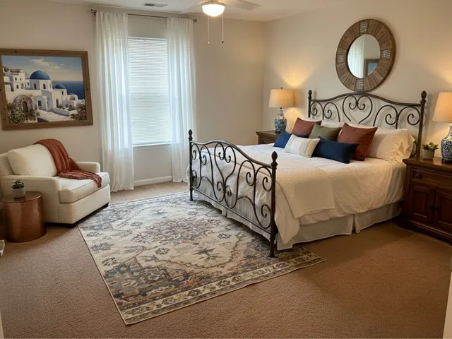 a bed room with a bed and mirror