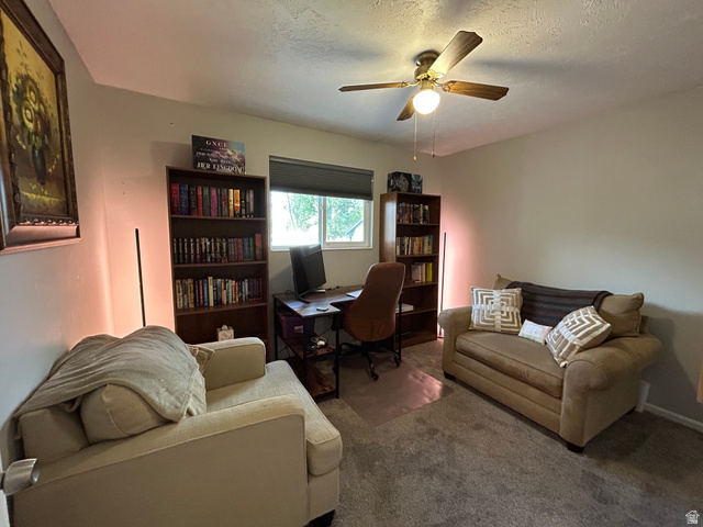 7659 State Street Midvale, UT 84047 - Photo 11 of 33 Home office with carpet flooring, a closet and a ceiling fan