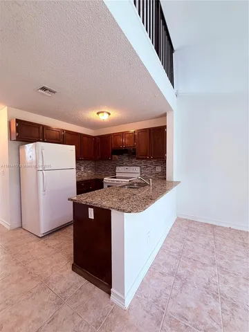 a view of an empty room with window