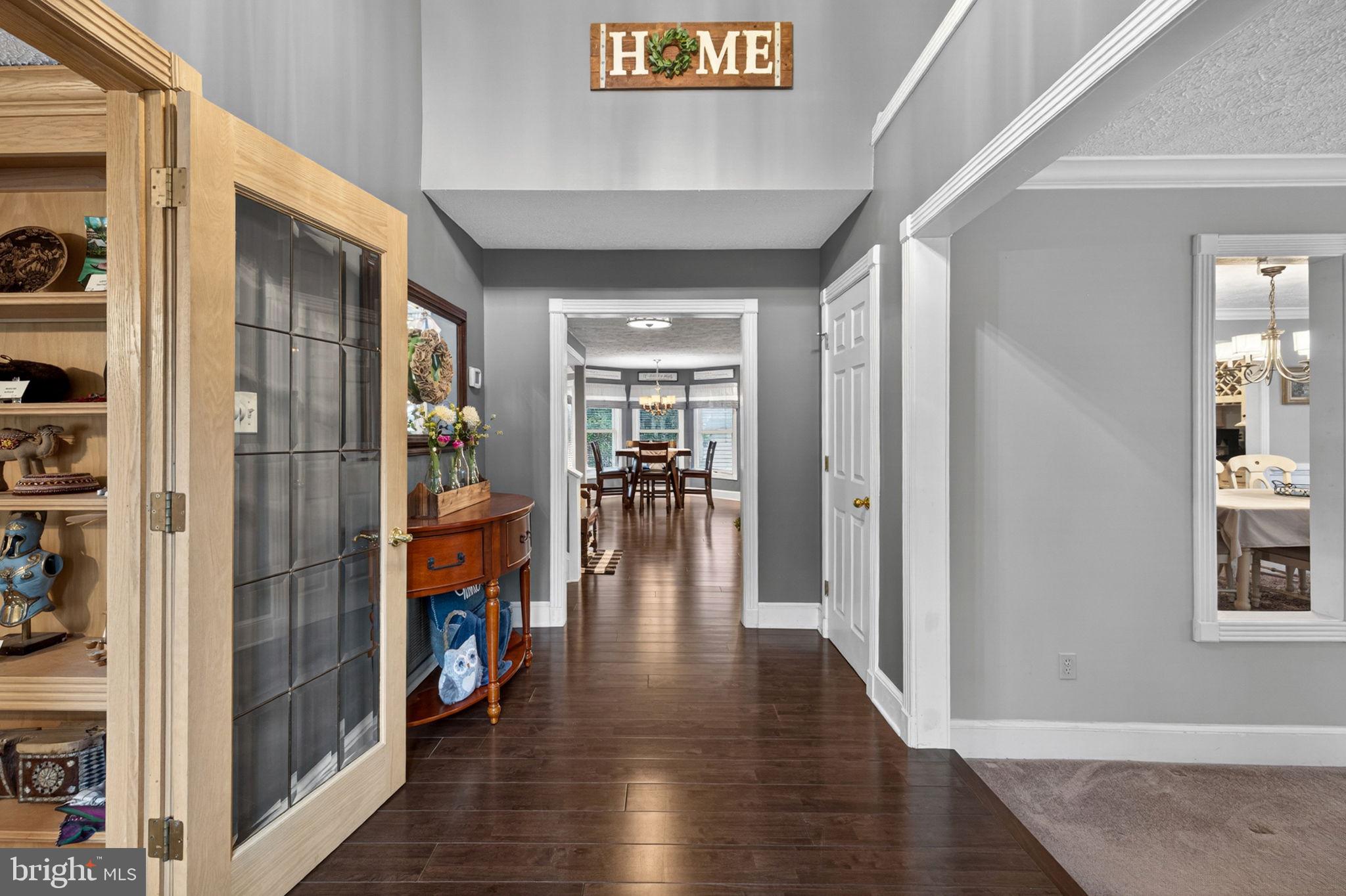 63 Rutherford Circle Sterling, VA 20165 - Photo 5 of 52 Looking through down the hallway.