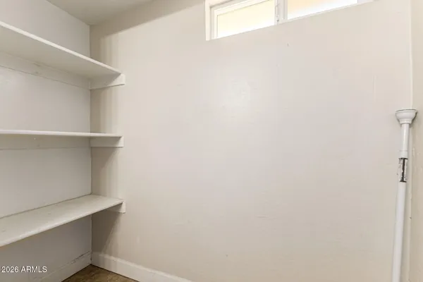 a view of small space with racks on the wall