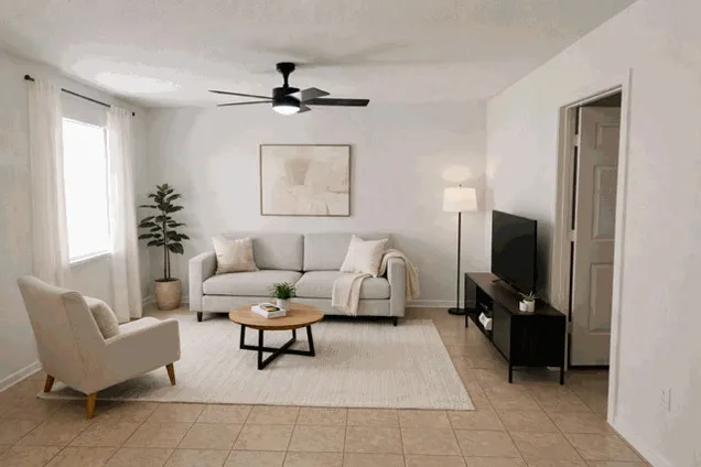 a living room with furniture and a flat screen tv