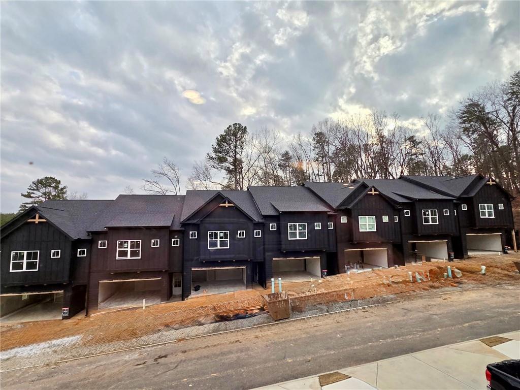 a front view of a building with a street