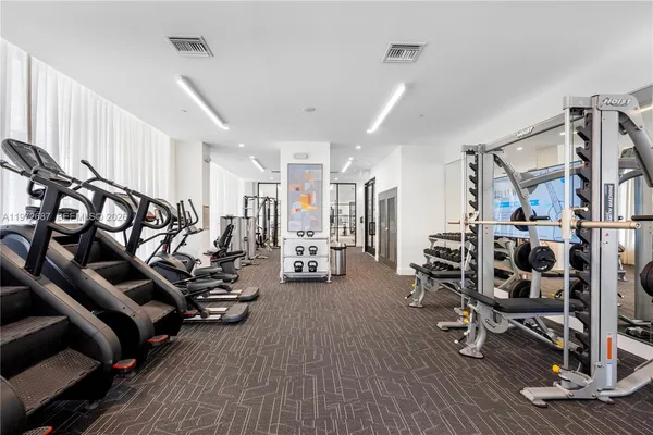 a view of a room with gym equipment
