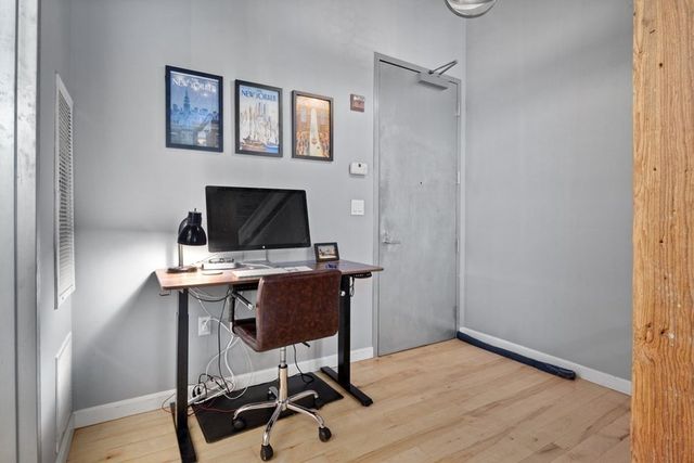 a kitchen with a table chairs and a stove