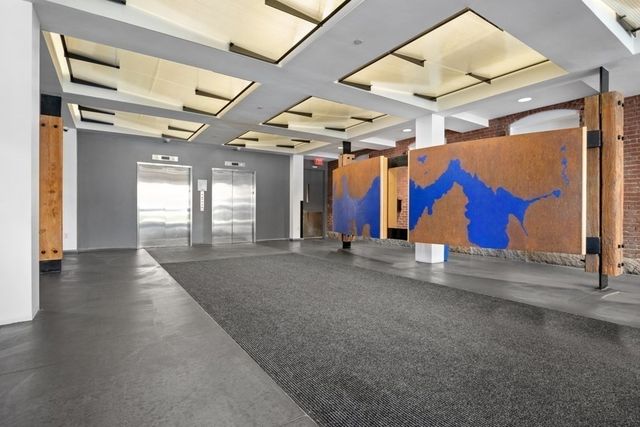 a view of gallery with windows