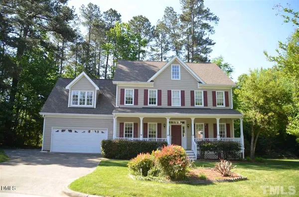 a front view of a house with yard