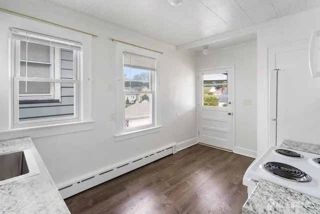 a view of livingroom with hardwood floor and a window