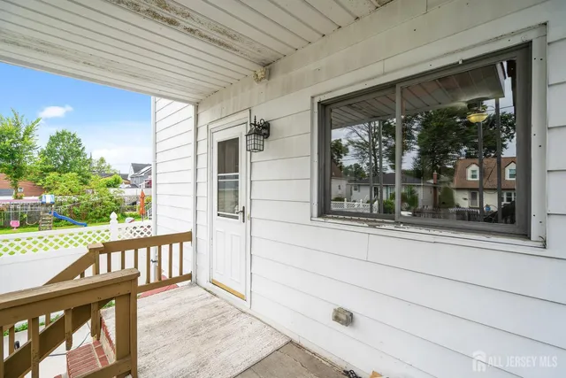 a view of a door and a window