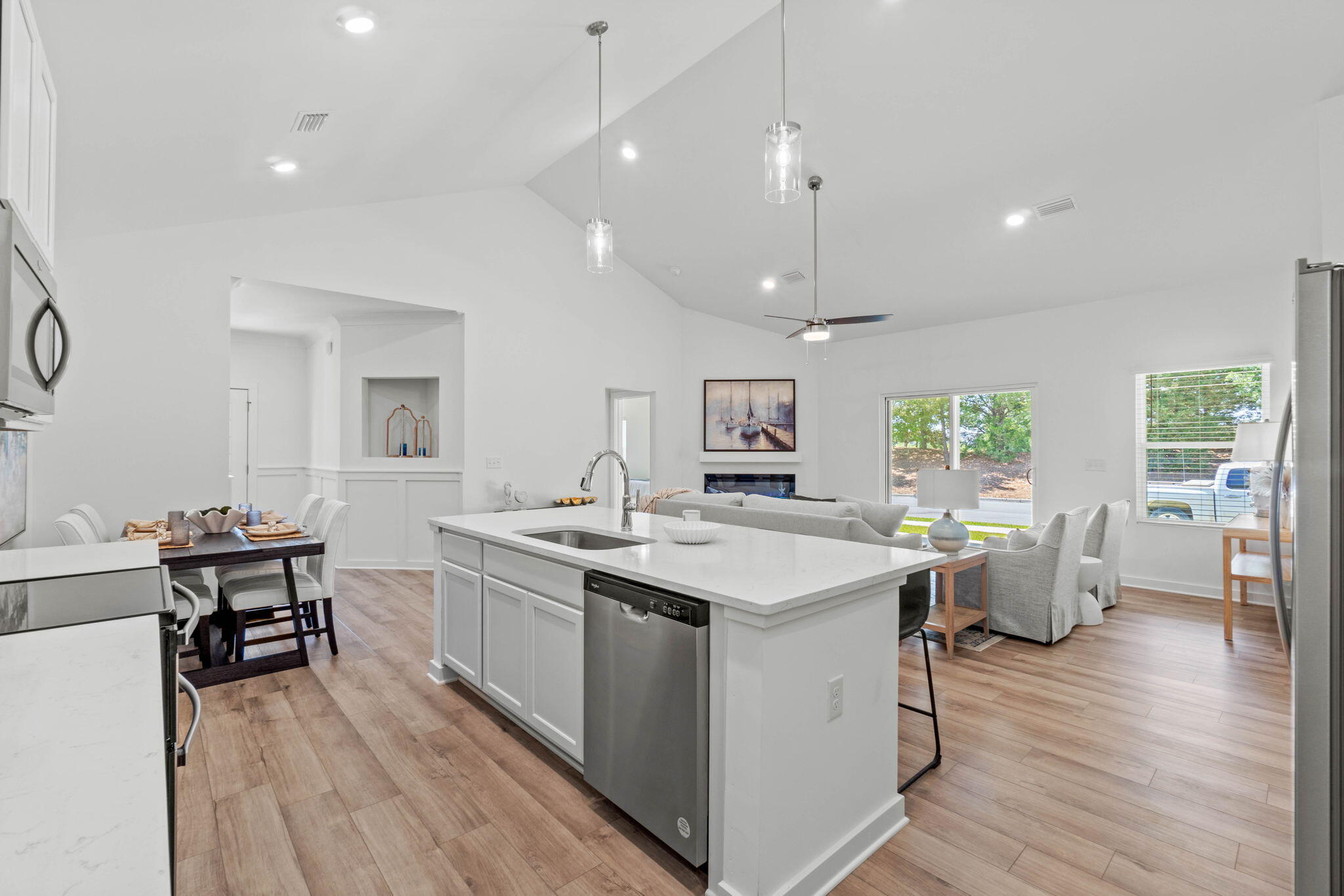 70 Parkside Street Freeport, FL 32439 - Photo 11 of 40 a kitchen with a sink and wooden floor