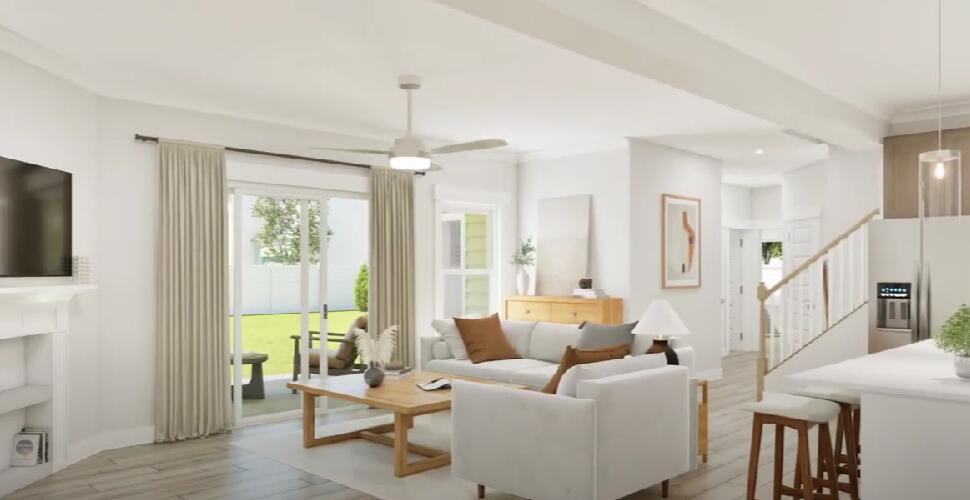 70 Parkside Street Freeport, FL 32439 - Photo 27 of 40 a living room with furniture and a chandelier