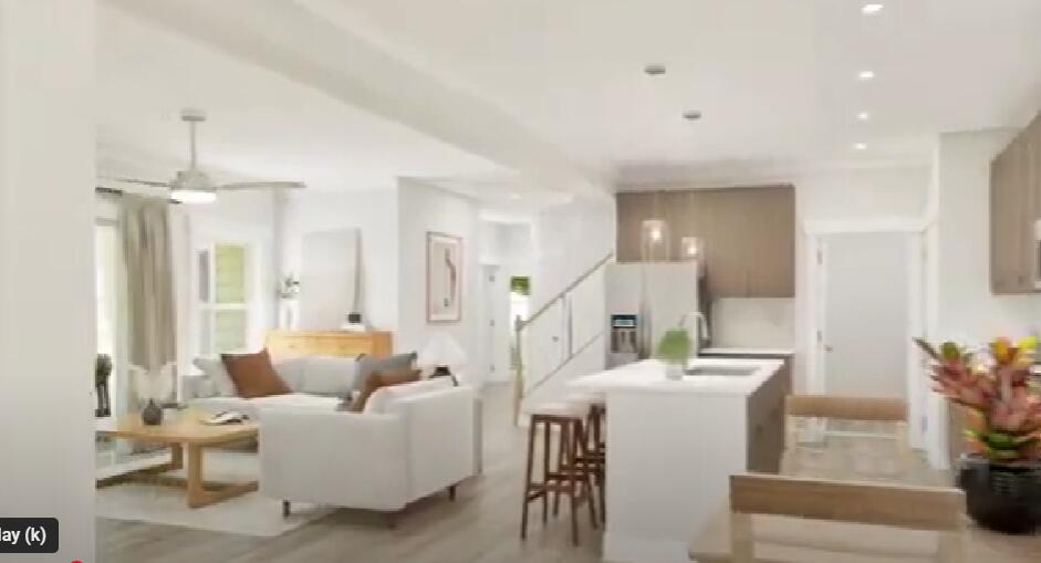 70 Parkside Street Freeport, FL 32439 - Photo 28 of 40 a living room with furniture and a chandelier