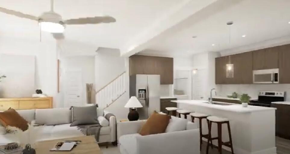 70 Parkside Street Freeport, FL 32439 - Photo 30 of 40 a living room with furniture and a view of kitchen