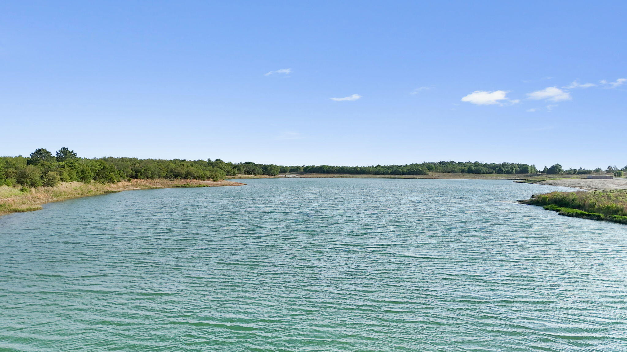 70 Parkside Street Freeport, FL 32439 - Photo 40 of 40 a view of lake with sunset in background