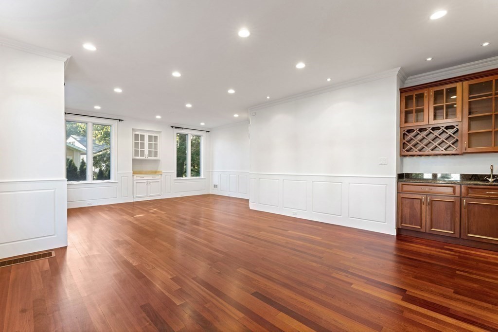 14 Cottonwood Road Newton, MA 02459 - Photo 7 of 40 a view of an empty room with wooden floor and a window