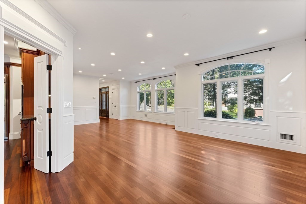 14 Cottonwood Road Newton, MA 02459 - Photo 9 of 40 a view of an empty room with wooden floor and a window
