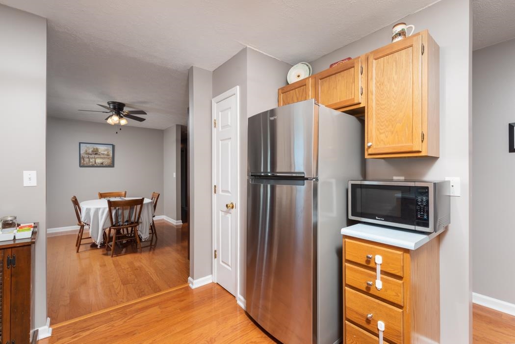 816 Battlefield Road Fort Defiance, VA 24437 - Photo 12 of 49 a kitchen with stainless steel appliances granite countertop a refrigerator and a stove top oven