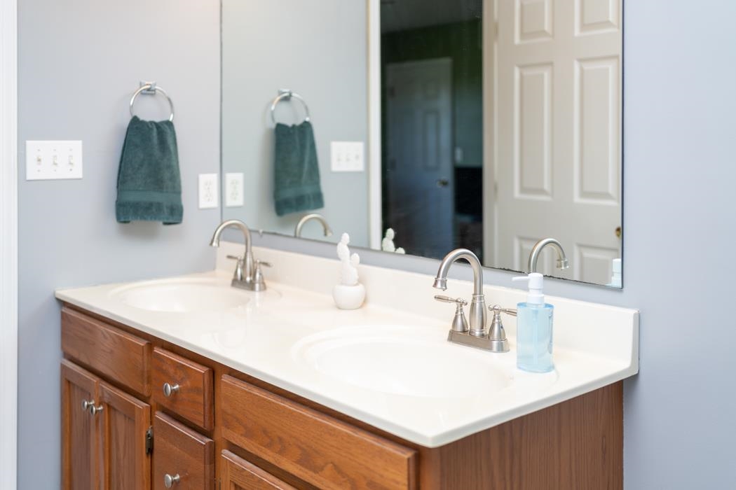 816 Battlefield Road Fort Defiance, VA 24437 - Photo 23 of 49 a bathroom with a sink and a mirror