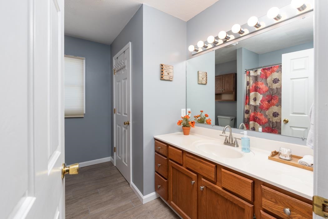 816 Battlefield Road Fort Defiance, VA 24437 - Photo 25 of 49 a bathroom with a sink and a mirror
