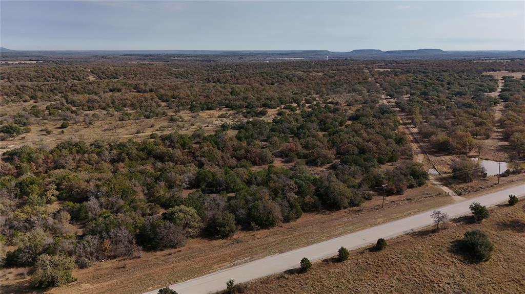 0 Davidson Cemetery Road Mingus, TX 76463 - Photo 4 of 7 an aerial view of a house with a mountain