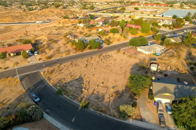 a view of swimming pool from a balcony