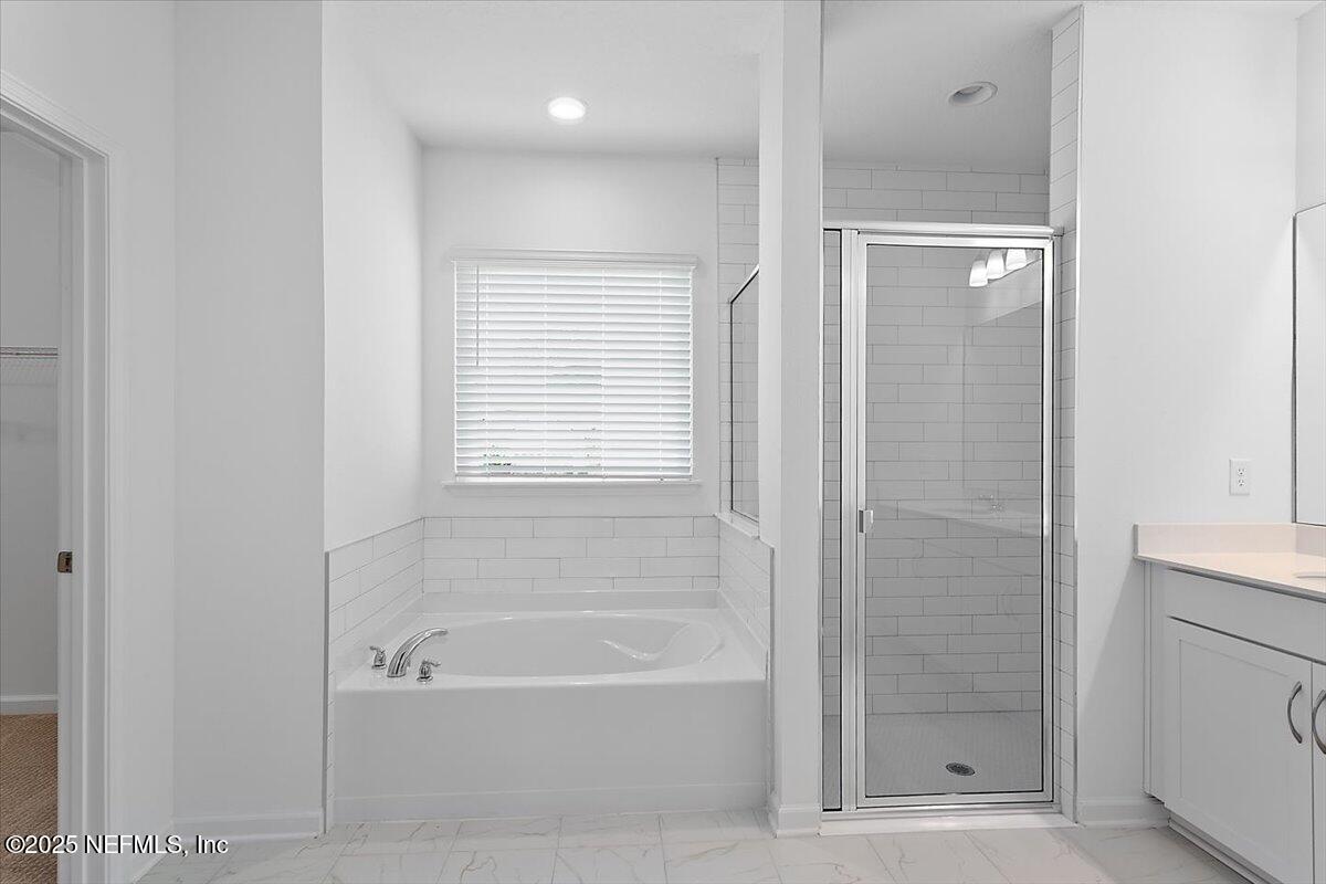 107 Crew Ct Street St. Augustine, FL 32092 - Photo 13 of 31 a bathroom with a bathtub and shower