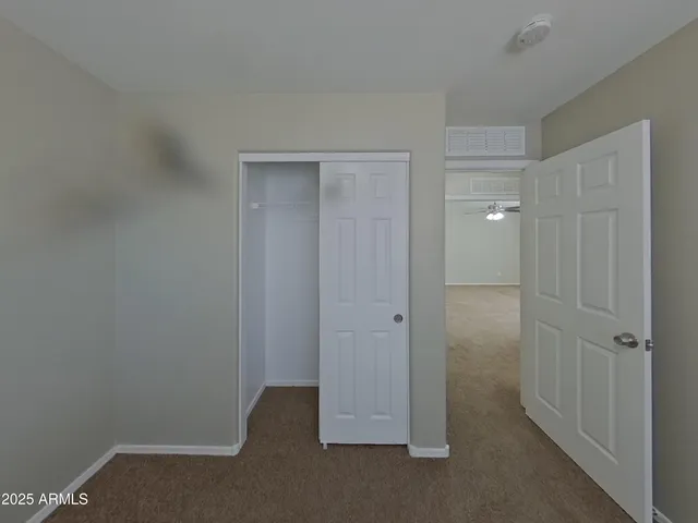 an empty room with closet